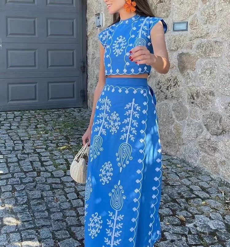 Set of a short top and a wrap skirt with an embroidered ethnic print