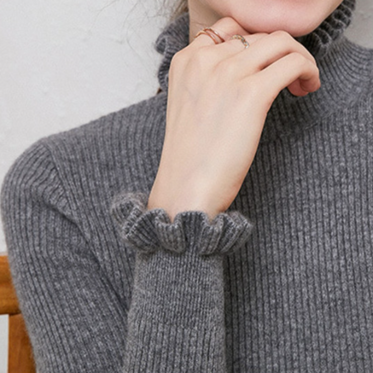 WW | Cozy roll-neck knit sweater with delicate ruffle details