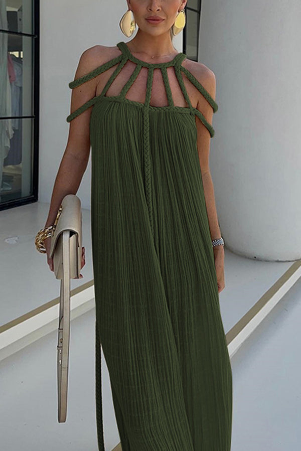 Long pleated dress with cord detailing and an artistic neckline