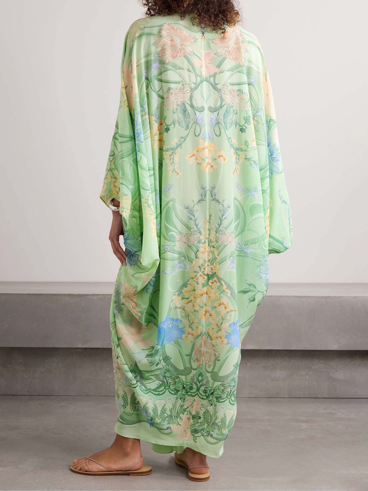 Unique midi dress with floral print, V-neck, and oversized fit