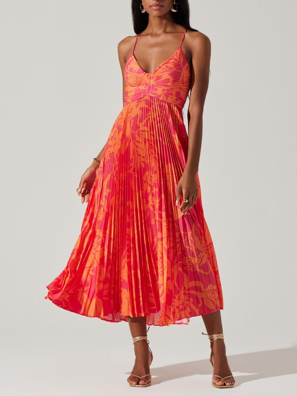 Elegant midi dress with floral pattern and pleats