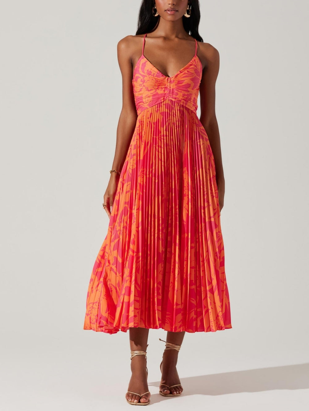 Elegant midi dress with floral pattern and pleats