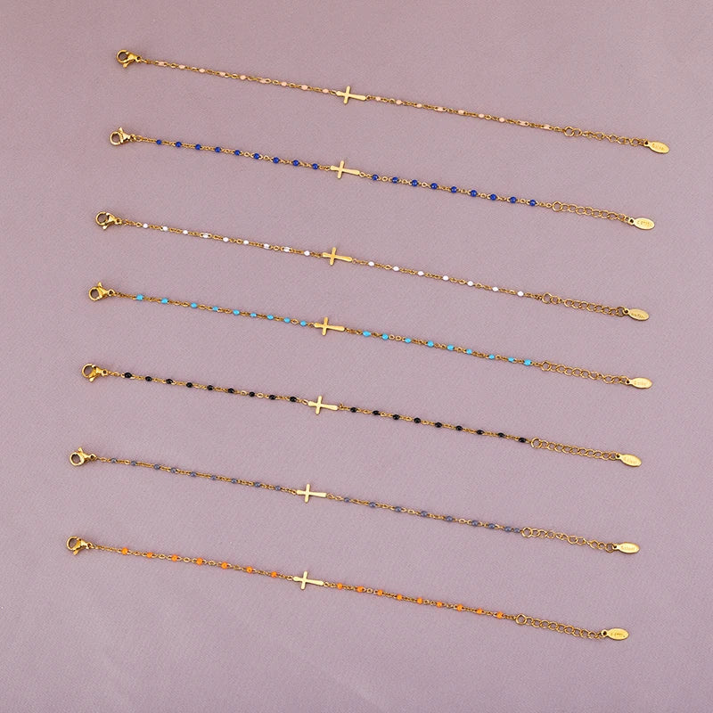 WW | Gold-colored cross bracelet