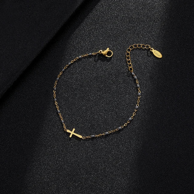 WW | Gold-colored cross bracelet