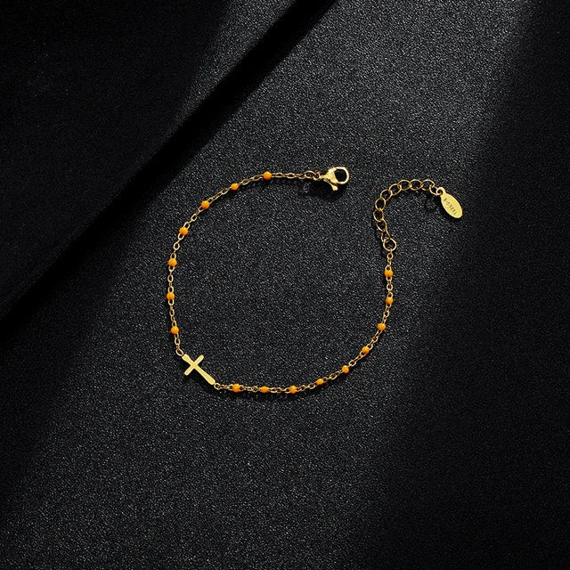 WW | Gold-colored cross bracelet