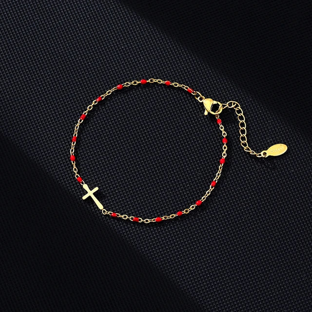 WW | Gold-colored cross bracelet