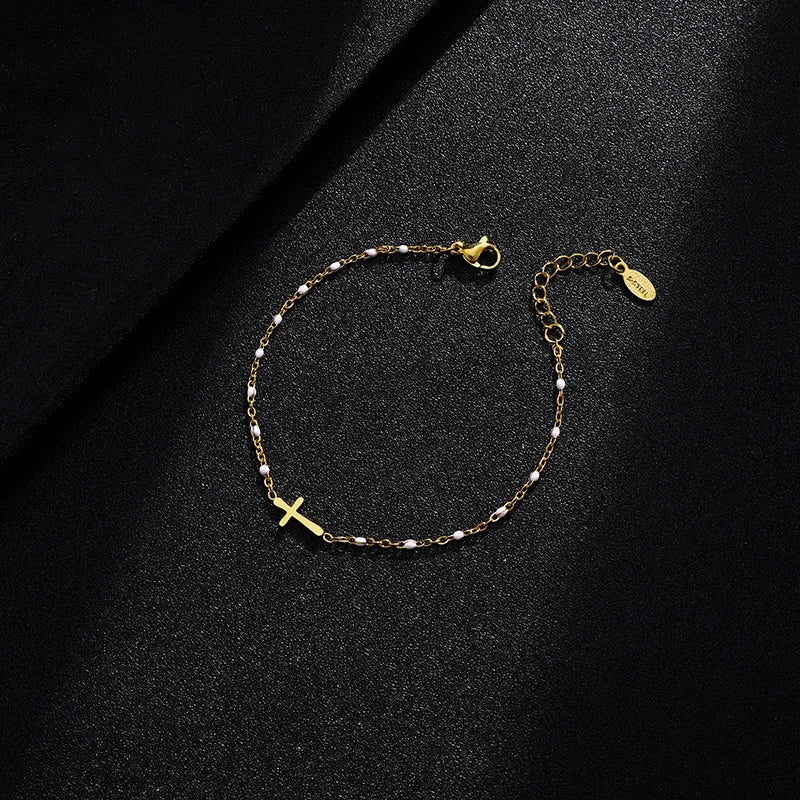 WW | Gold-colored cross bracelet