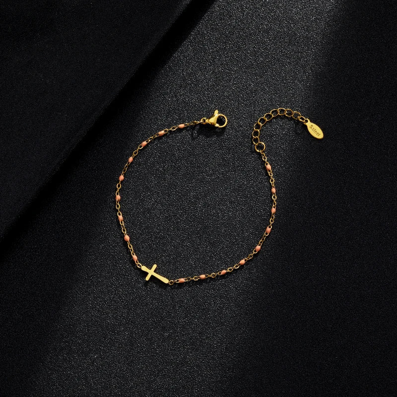 WW | Gold-colored cross bracelet
