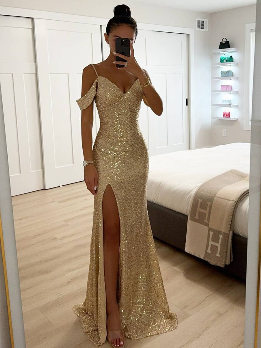 Long sequin dress with V-neck, side slit, and thin straps for elegant occasions