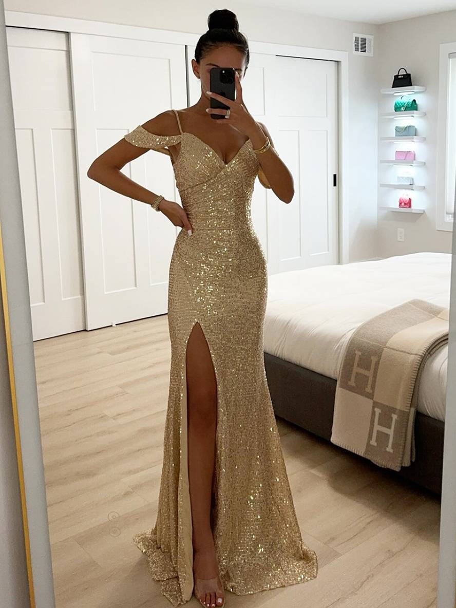 Long sequin dress with V-neck, side slit, and thin straps for elegant occasions