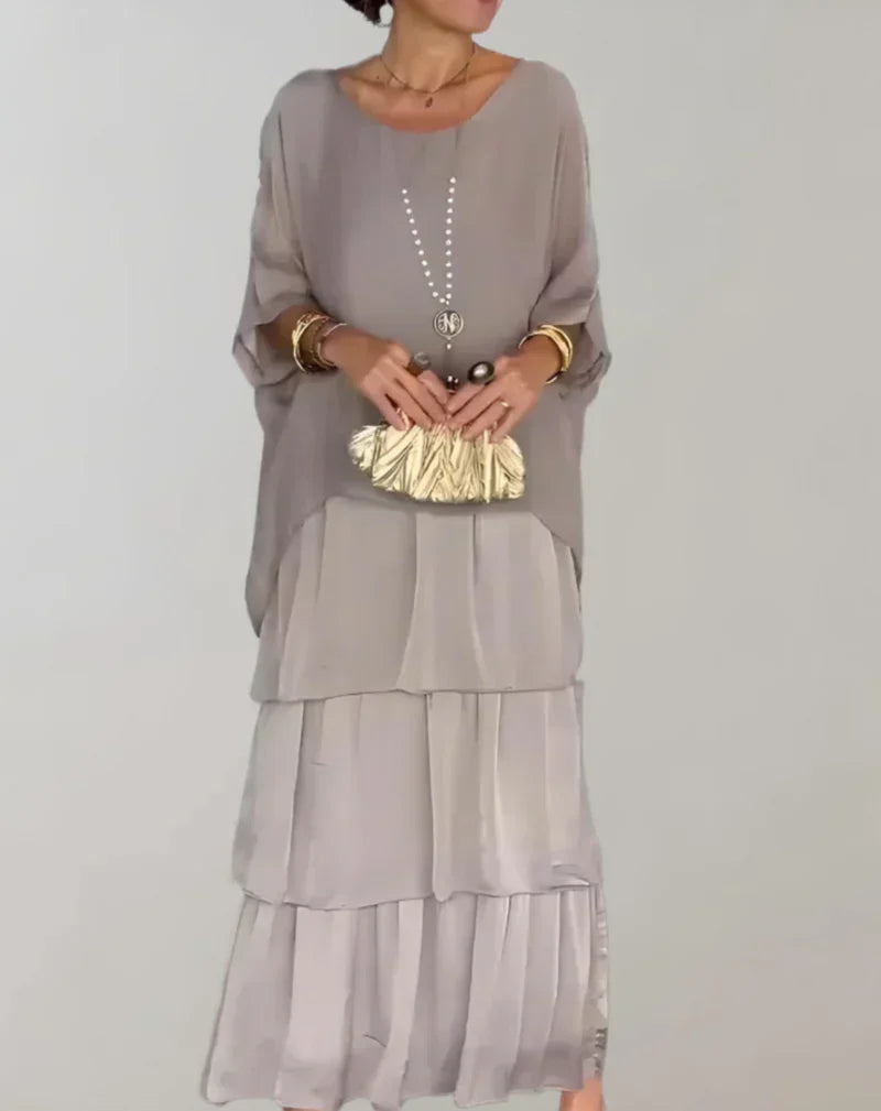WW | Elegantes Maxikleid mit Fledermausärmeln und Gestuftem Rundhalsausschnitt