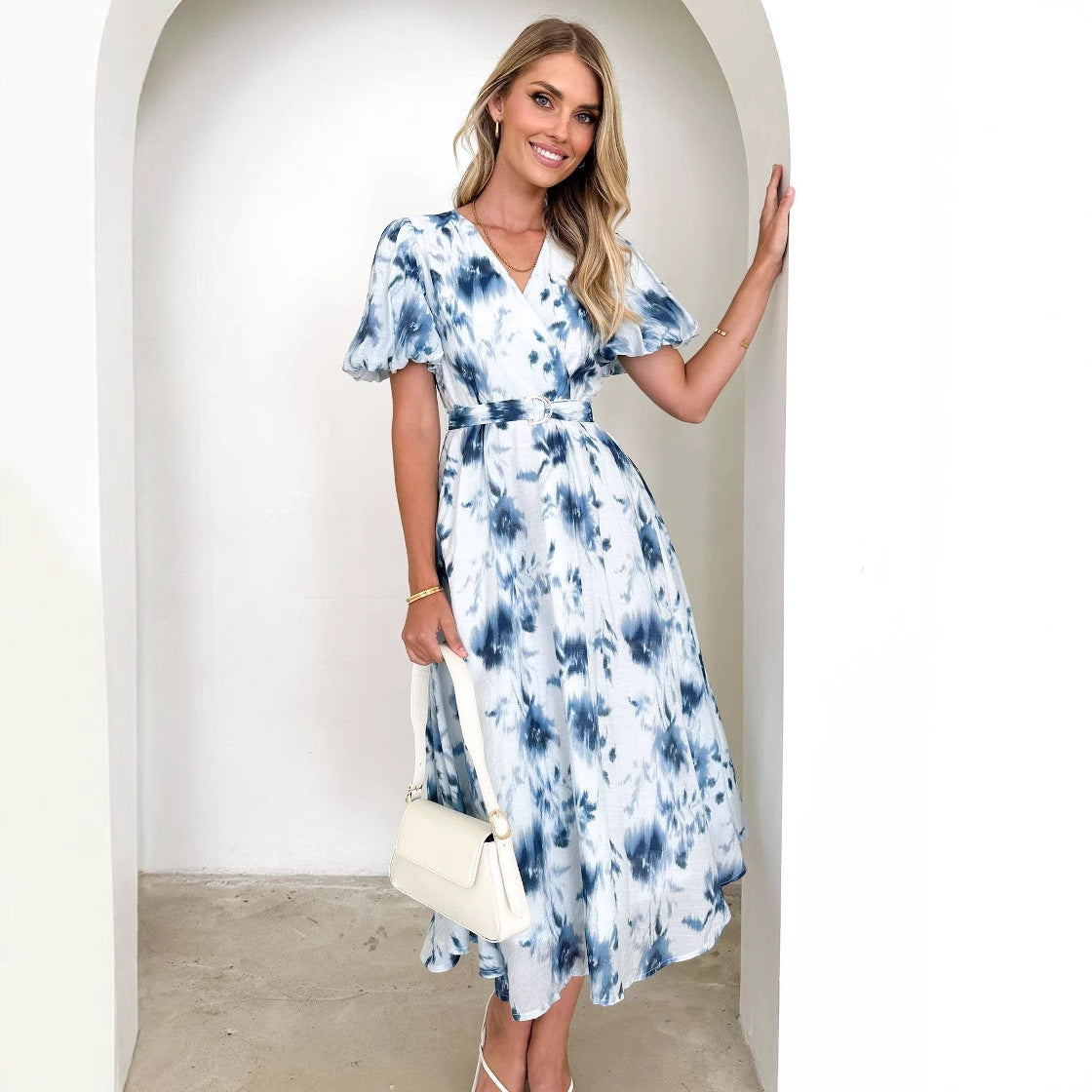 Women's midi dress with a fitted silhouette, voluminous sleeves, and an elegant wave pattern WW