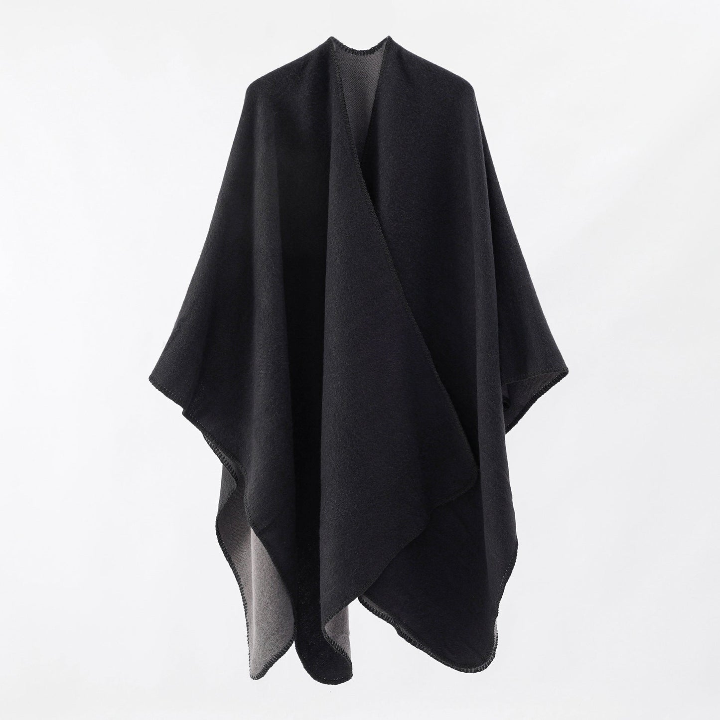 Women's knitted poncho with an asymmetrical cut and high thermal insulation