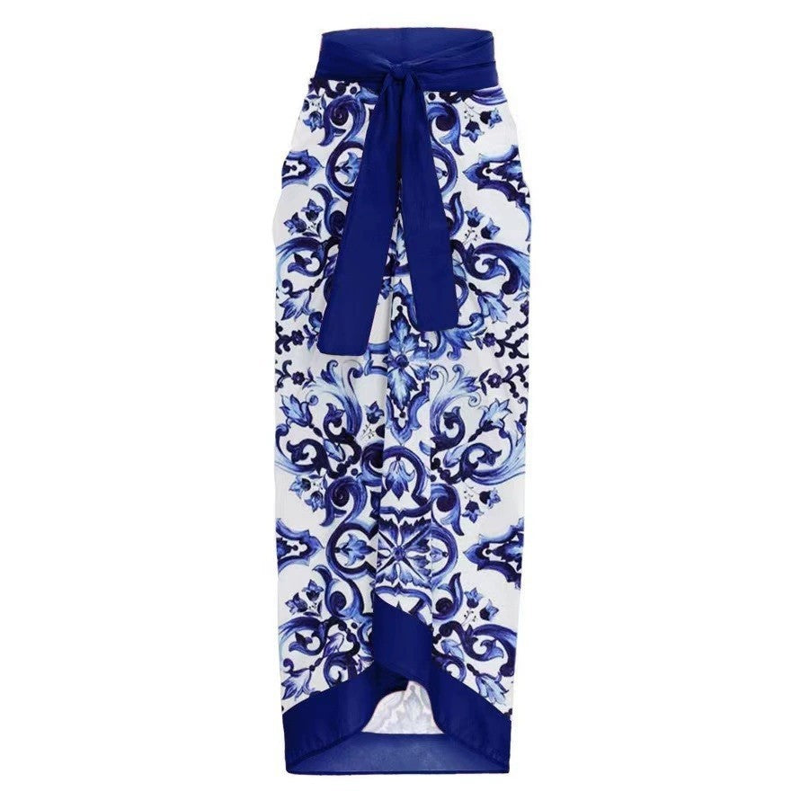 Women's swimsuit set with elegant wrap-skirt look and charming motif WW