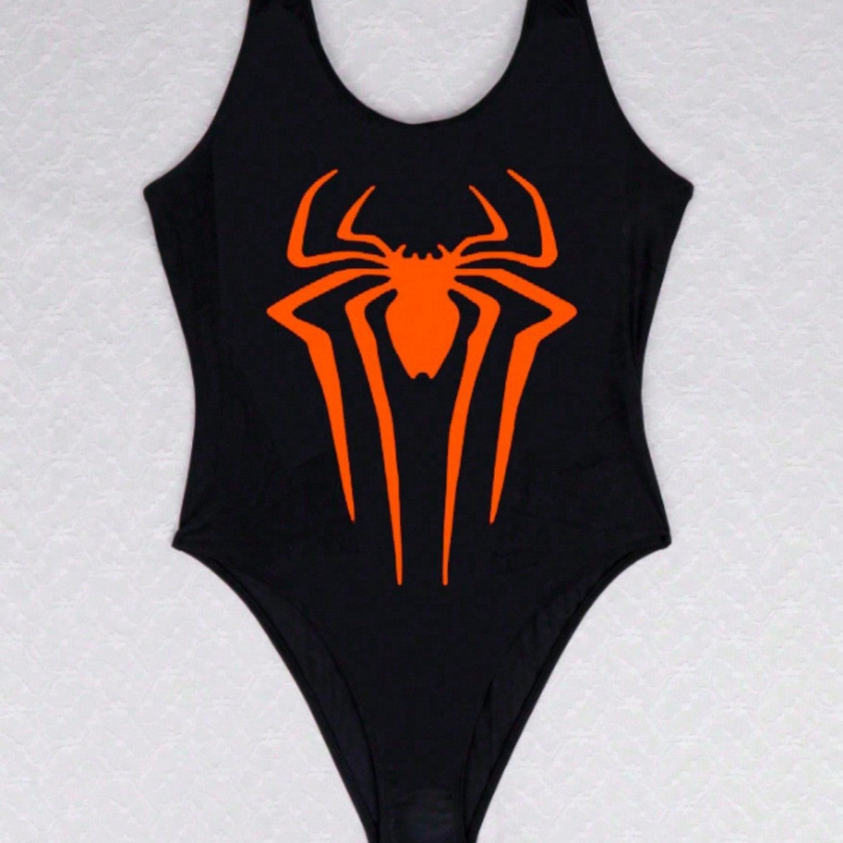 Damen Badeanzug mit stylischem Spinnenmotiv und hohem Beinausschnitt W&W