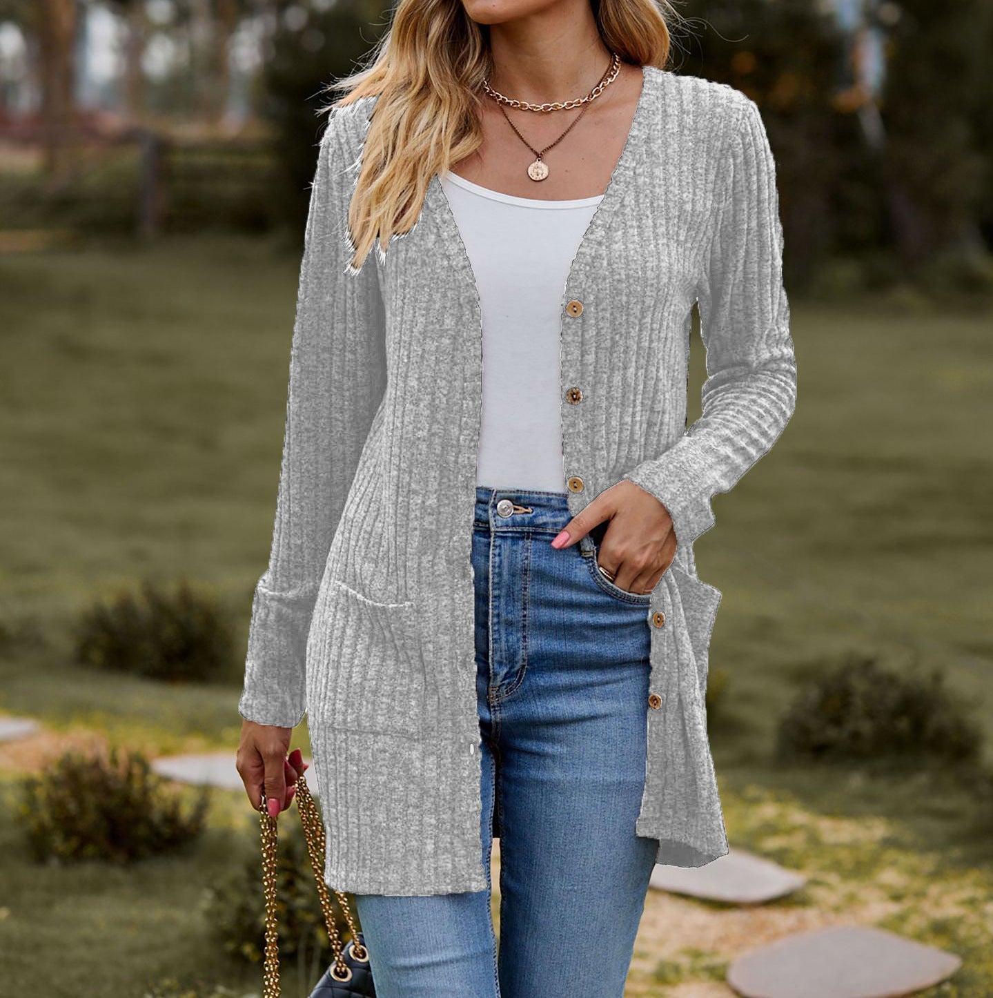 Damen Strickjacke mit elegantem Rippenmuster und praktischen Taschen WW