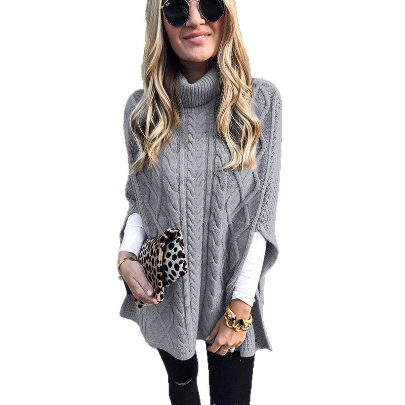 Women's chunky knit poncho with high collar and cable knit design WW