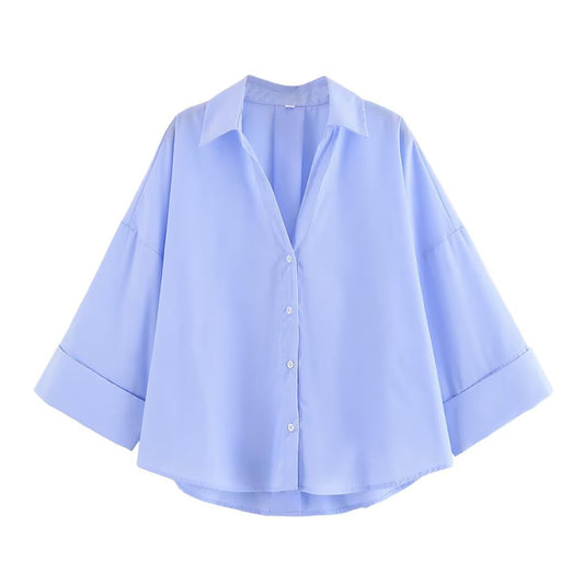 Women's blouse with an oversized cut and stylish lapel WW