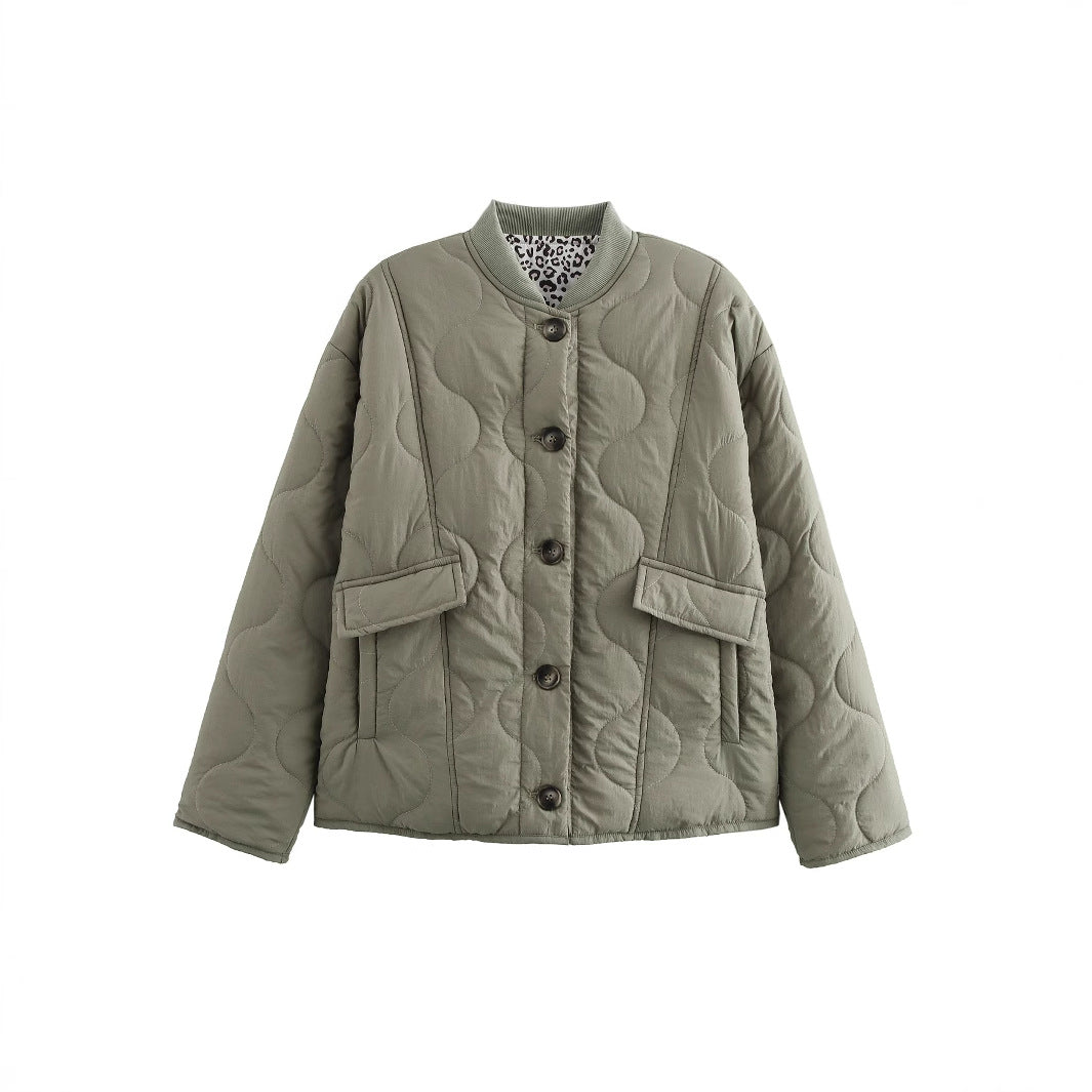 Women's quilted jacket in an elegant design with practical button fastening and side pockets WW