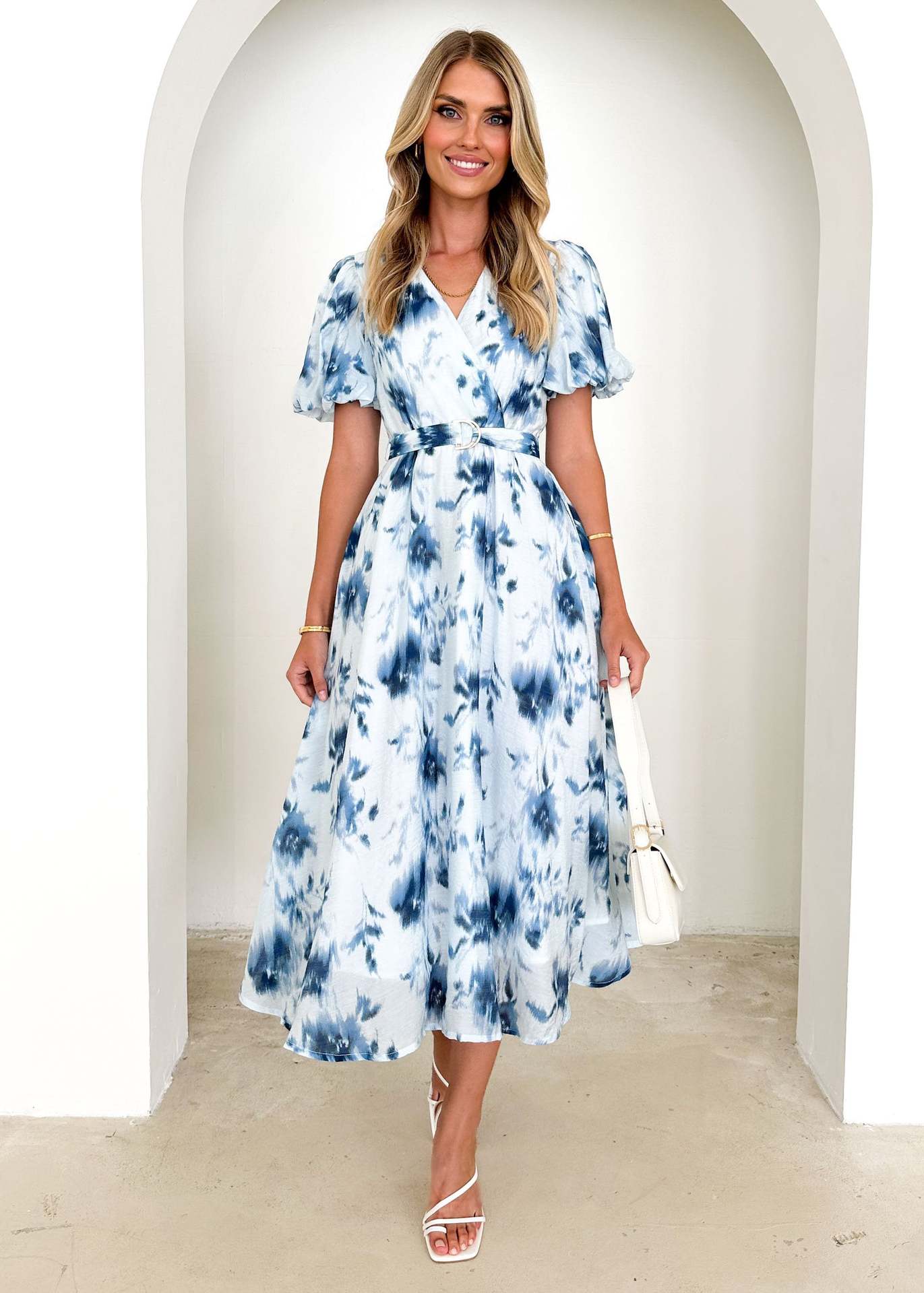 Women's midi dress with a fitted silhouette, voluminous sleeves, and an elegant wave pattern WW