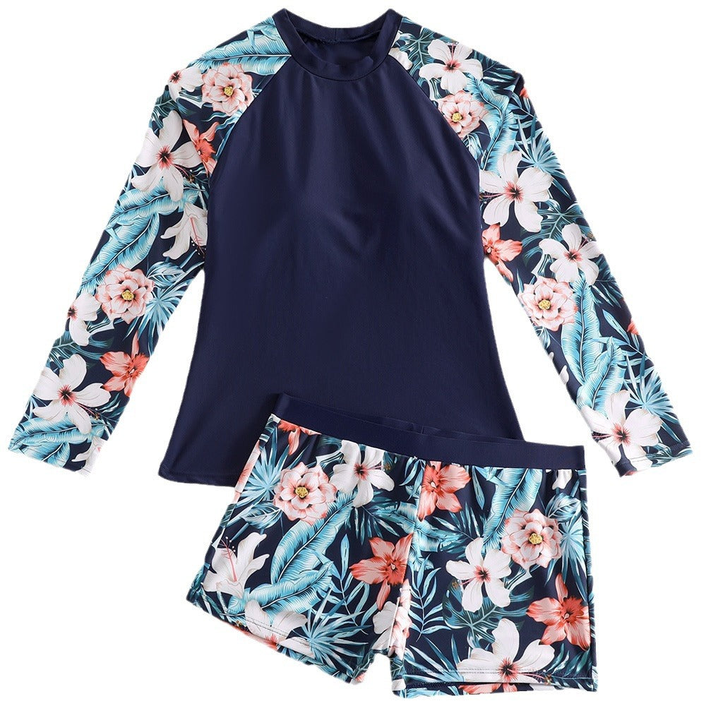 WW | Damen UV-Schutz Surfanzug mit floralem Design und kontrastierenden Ärmelakzenten