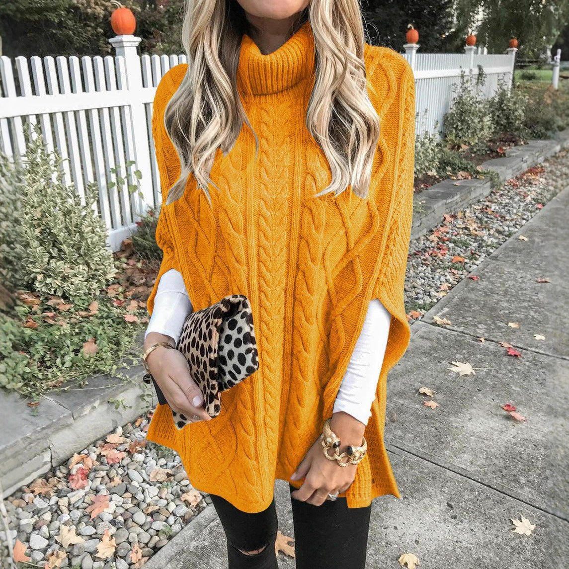 Women's chunky knit poncho with high collar and cable knit design WW