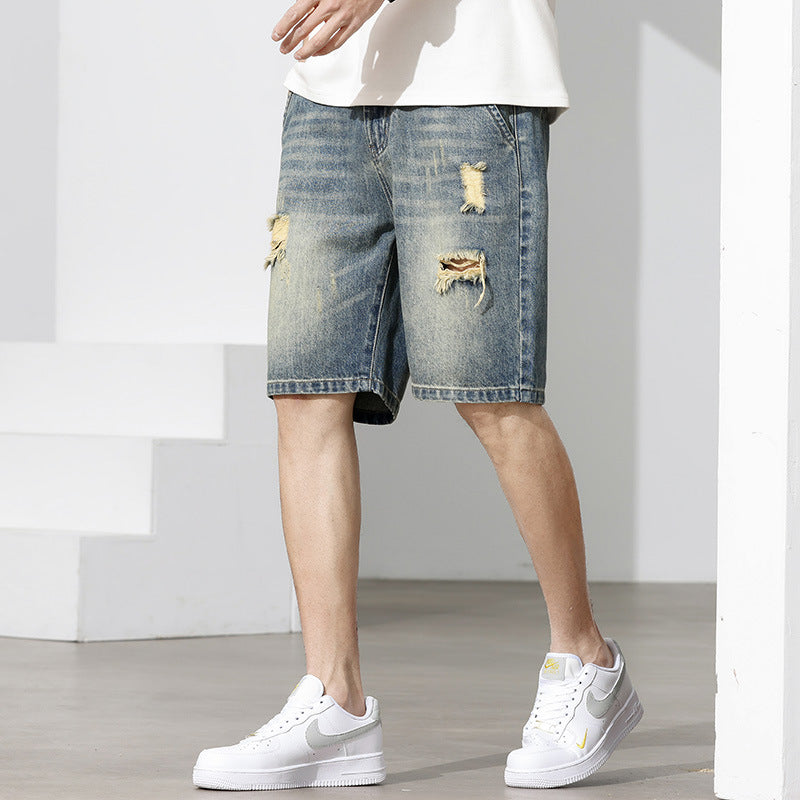 Men's denim shorts with a stylish distressed effect and a casual cut WW