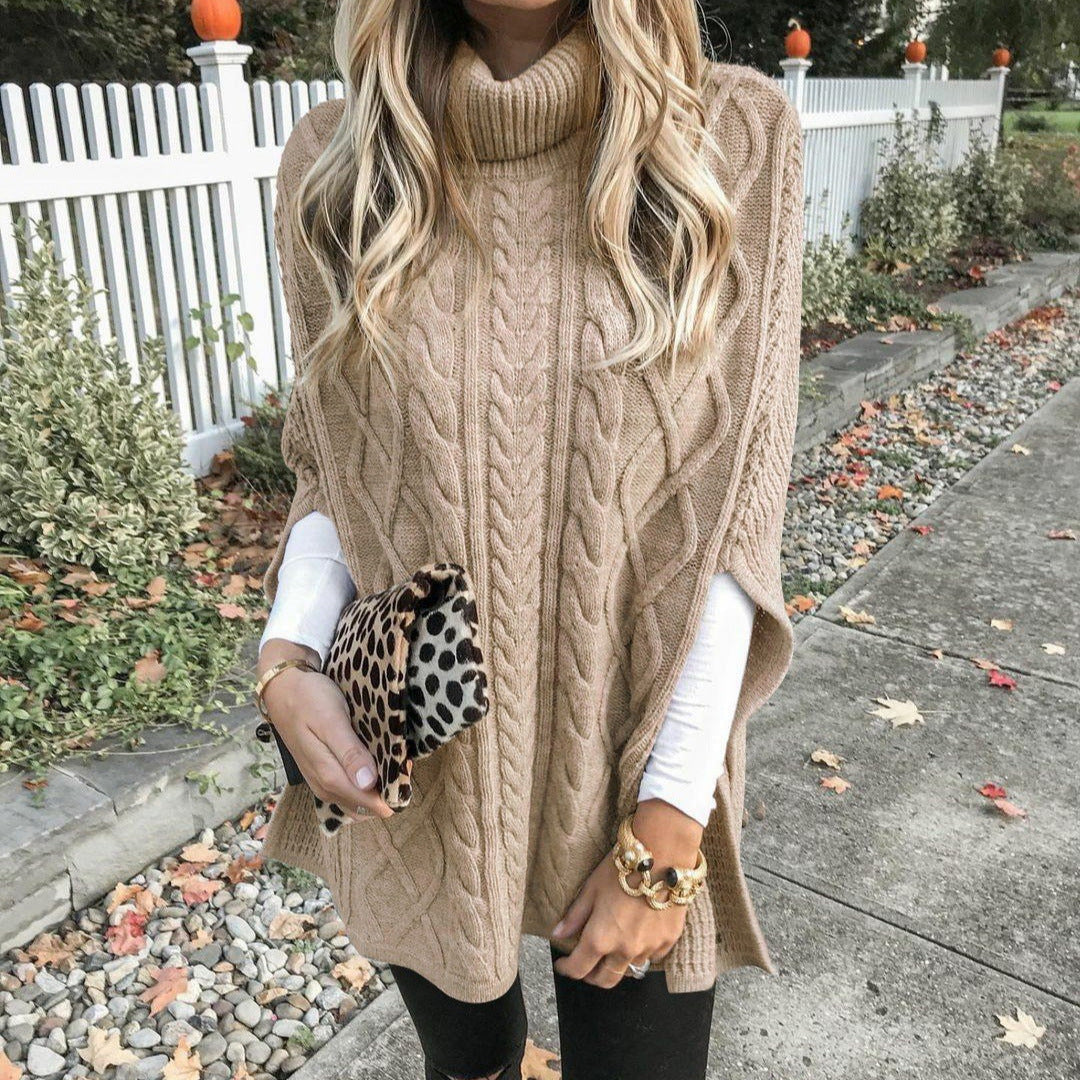 Women's chunky knit poncho with high collar and cable knit design WW