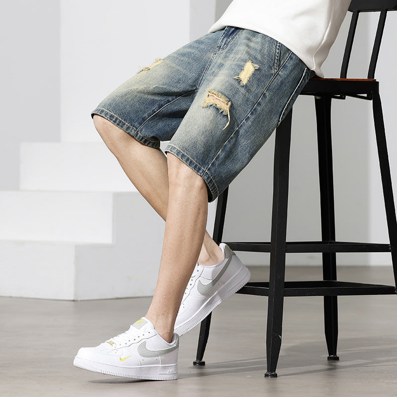 Men's denim shorts with a stylish distressed effect and a casual cut WW