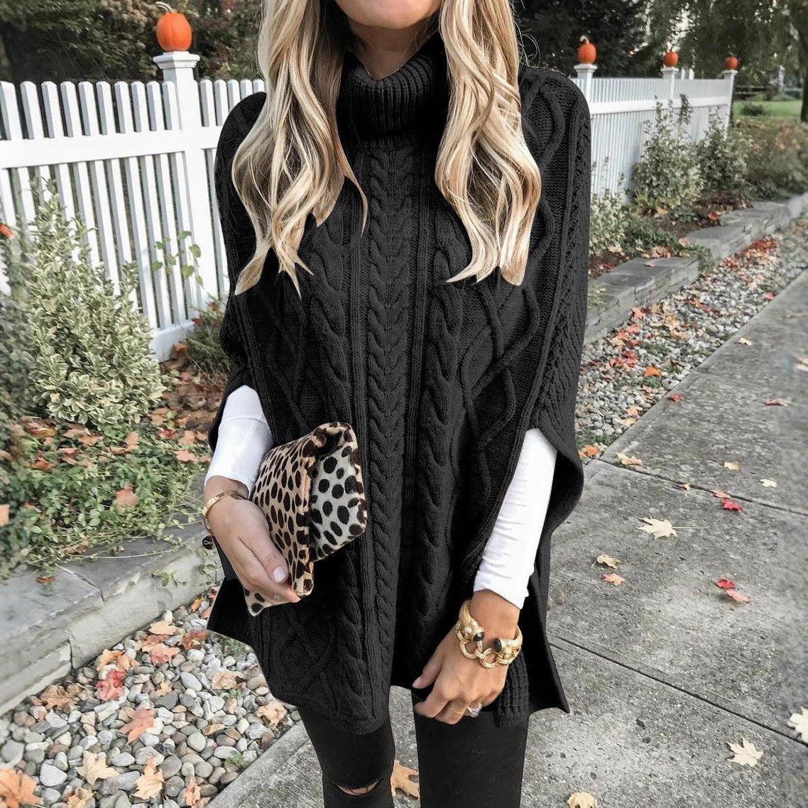 Women's chunky knit poncho with high collar and cable knit design WW