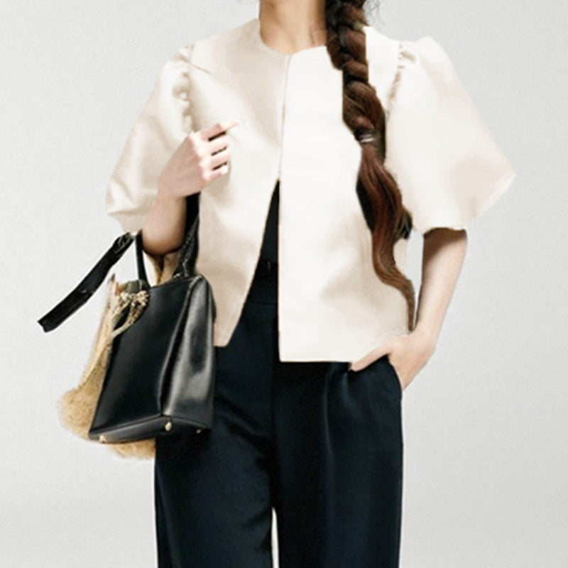 Damen Bluse mit voluminösen Puffärmeln und modernem Design WW