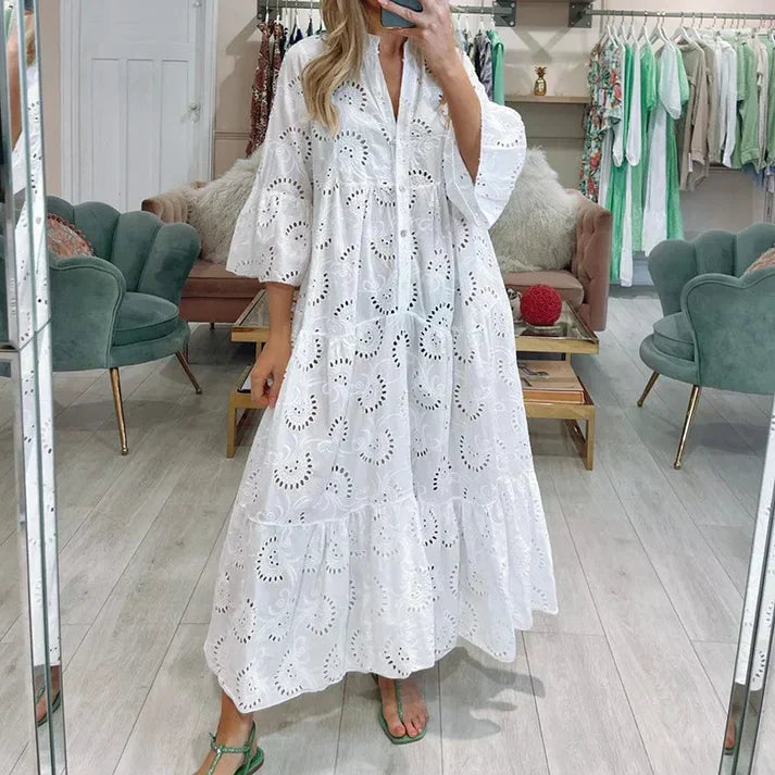 WW | Elegantes Kleid mit Bestickten Ösen