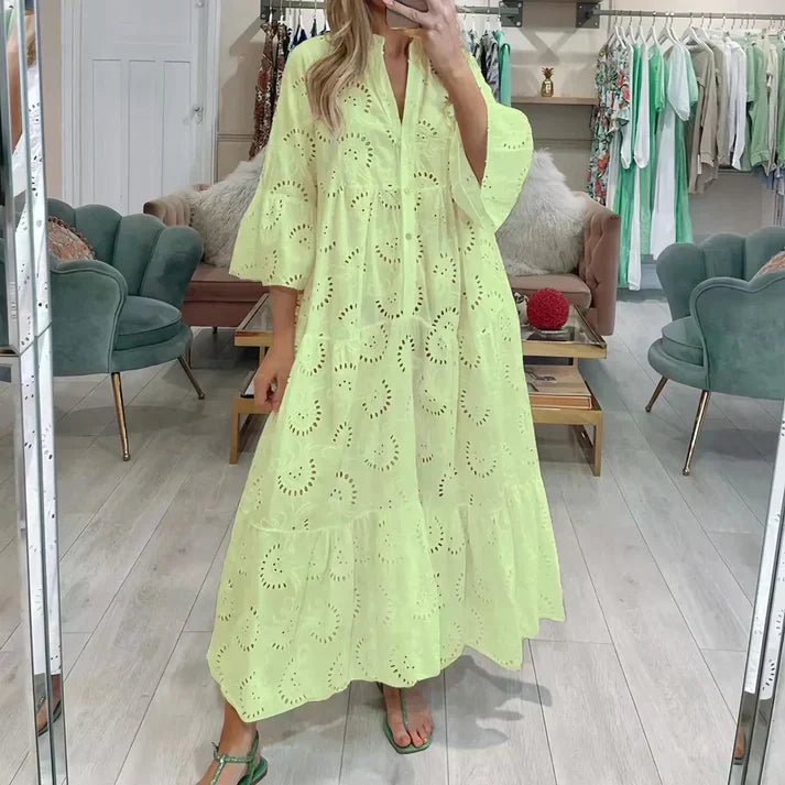 WW | Elegantes Kleid mit Bestickten Ösen