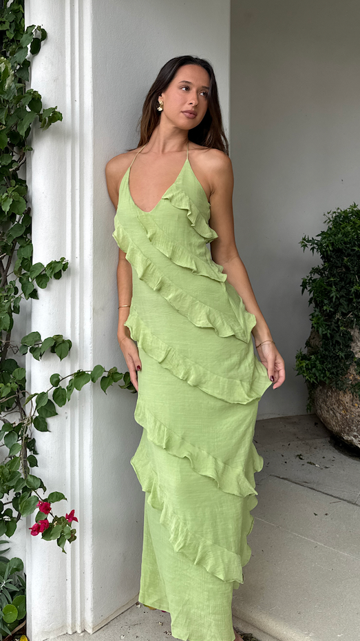 Modern, lightweight long dress with fine drawstring at the neckline and diagonal ruffles