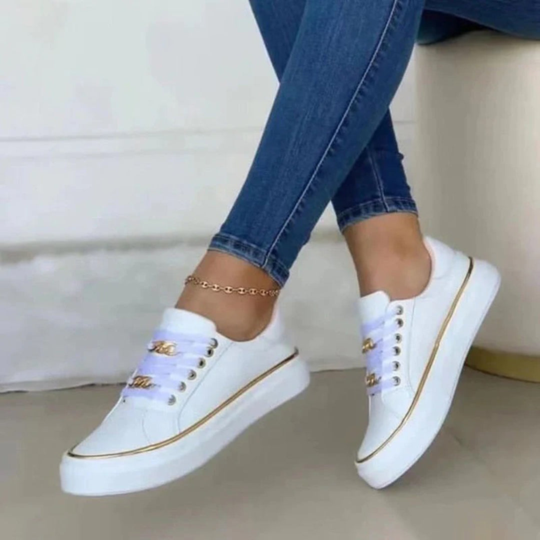 WW | stilvolle Damenschuhe Sneakers mit goldenen Akzenten