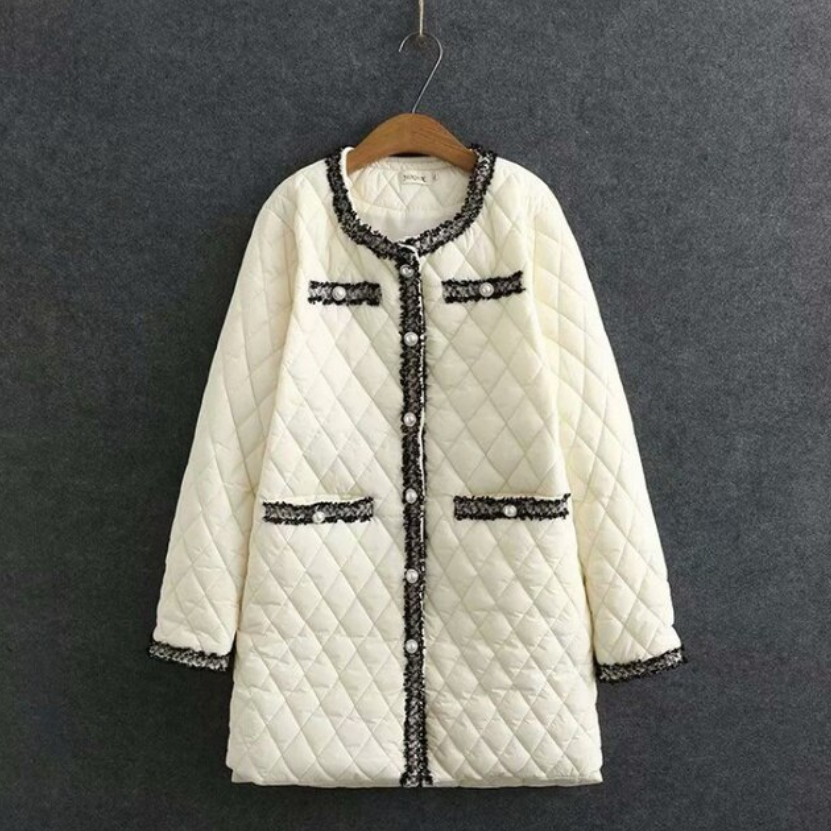 WW | A long women's coat, adorned with pearls