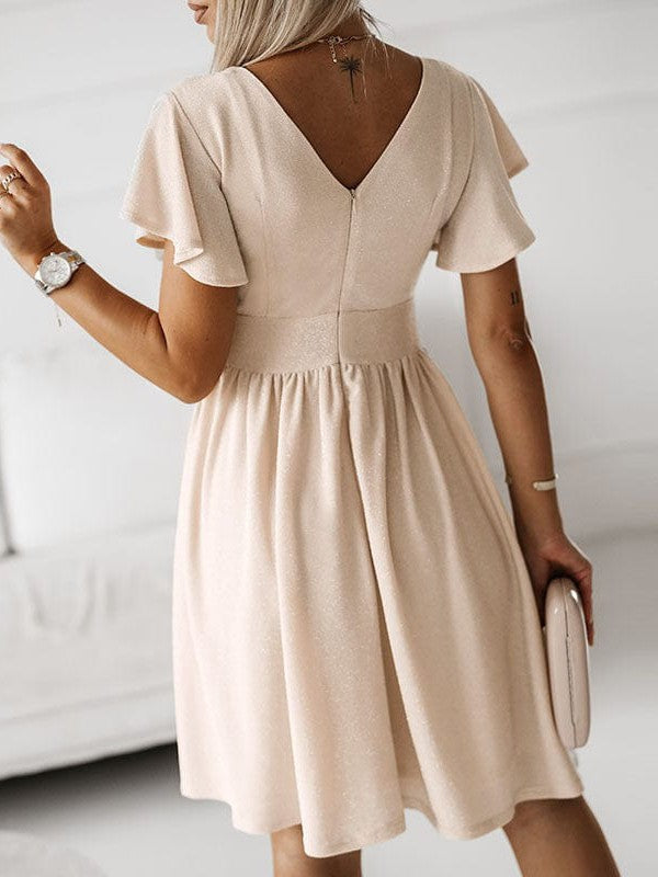 Elegant V-neck dress with pleats and ruffle details for a sophisticated look