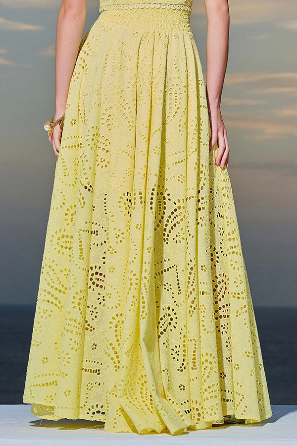 Two-piece embroidered set with long high-waisted skirt with pockets