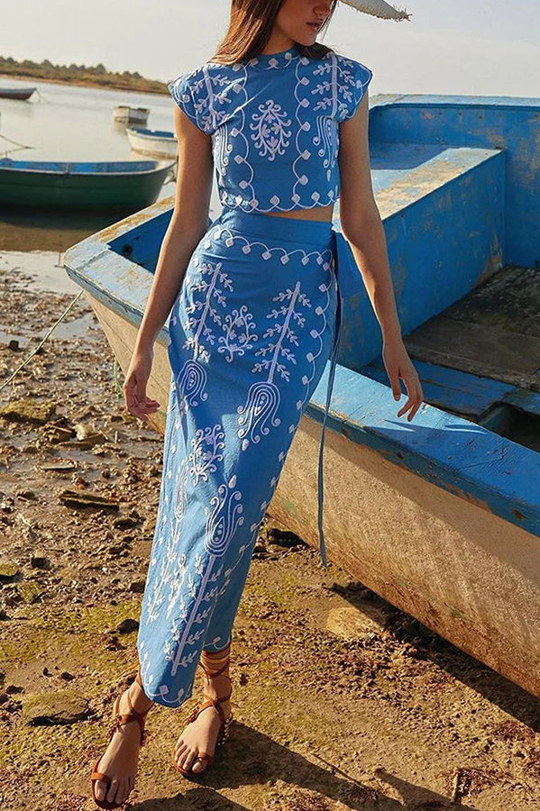 Set of a short top and a wrap skirt with an embroidered ethnic print