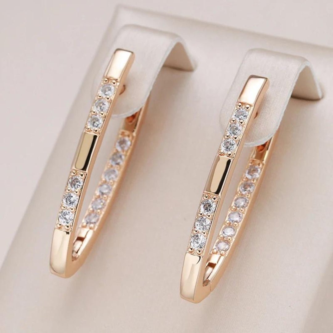 WW | Earrings in Gold