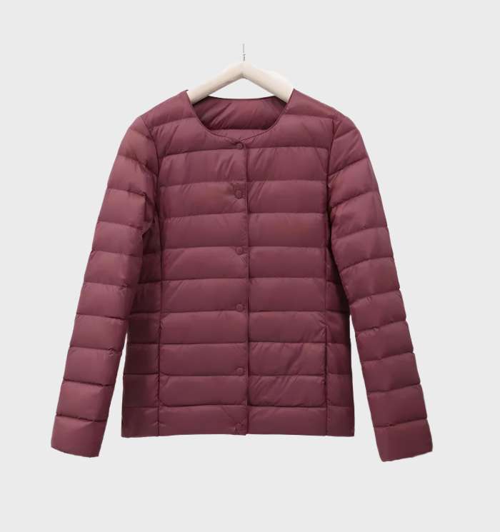 WW | Unifarbene wattierte Jacke mit Rundhalsausschnitt für Damen