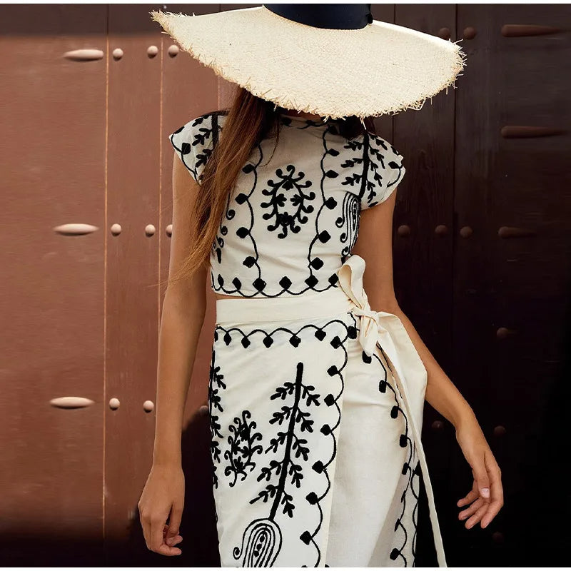 Set of a short top and a wrap skirt with an embroidered ethnic print