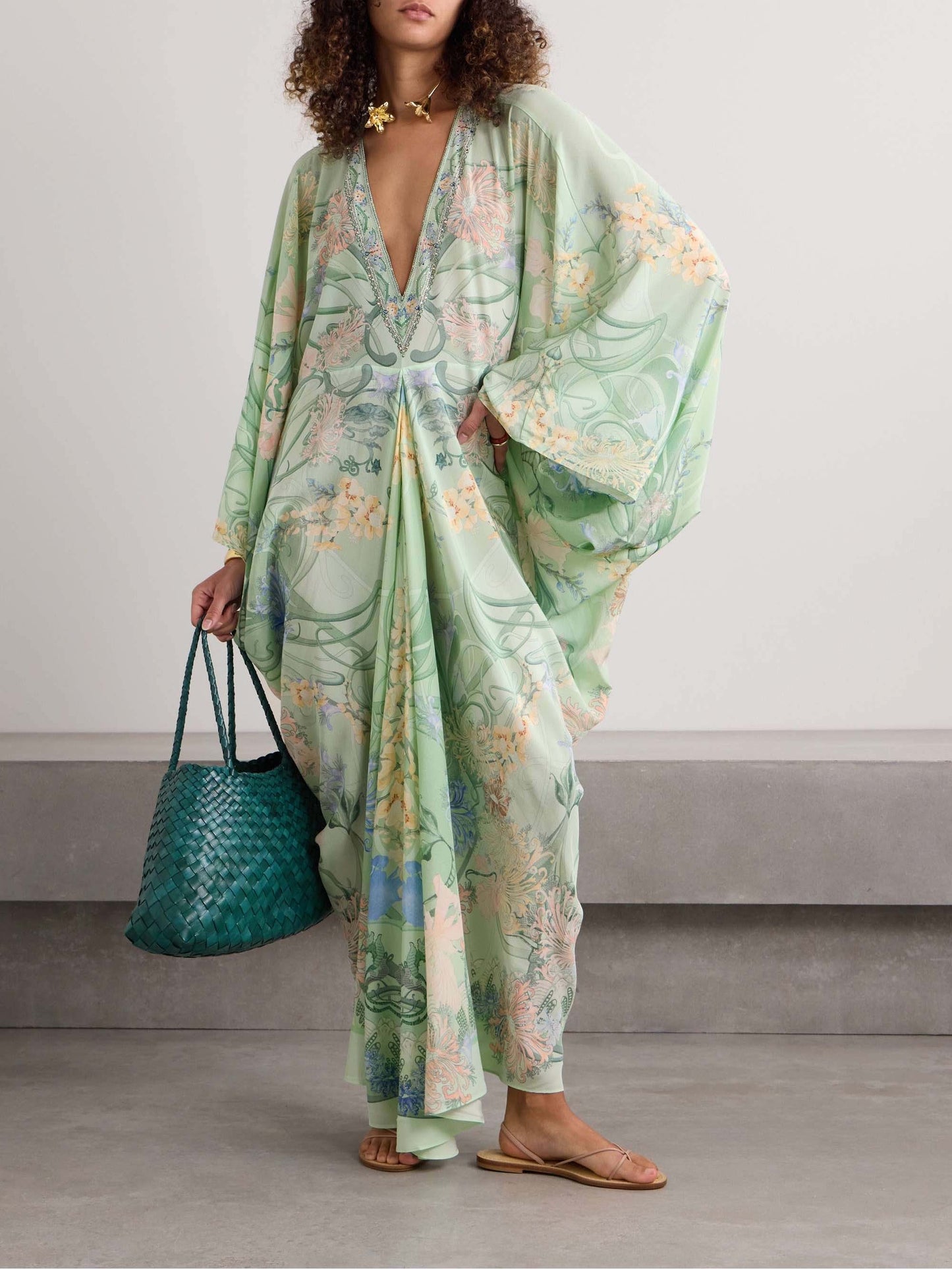 Unique midi dress with floral print, V-neck, and oversized fit