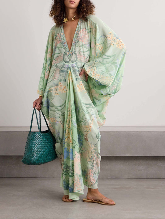 Unique midi dress with floral print, V-neck, and oversized fit