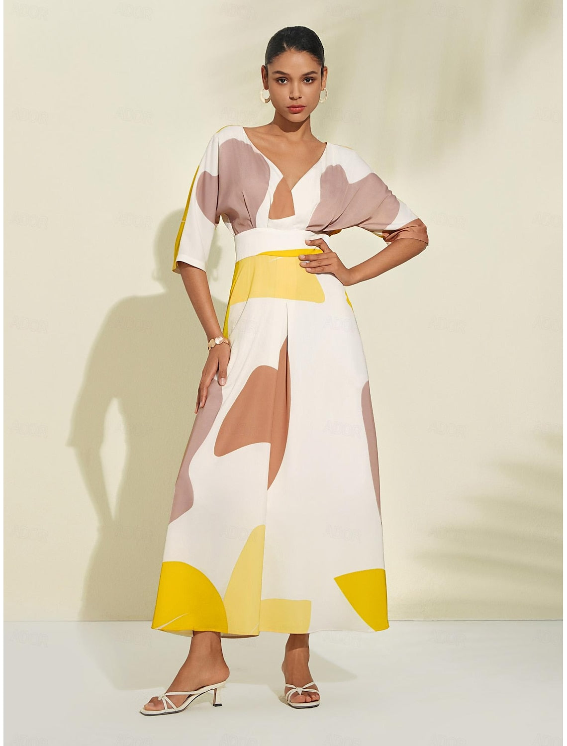 Elegant long summer dress with cut-out neckline and three-quarter sleeves
