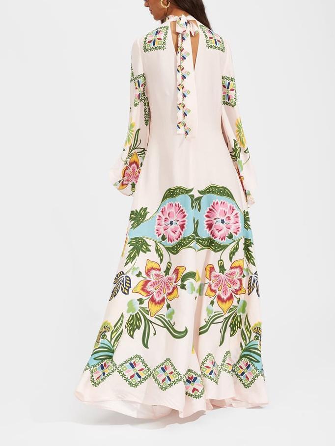 Exquisite, flowing maxi dress with a sunny floral print