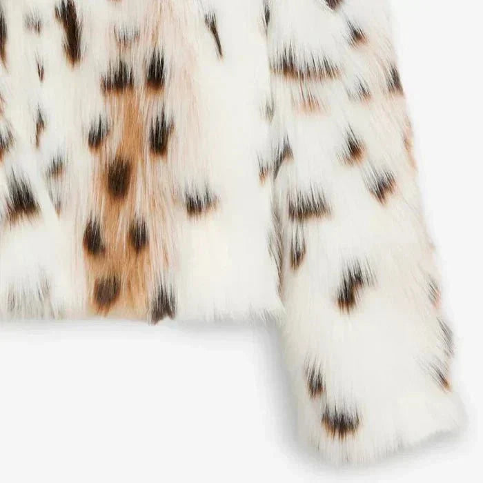 WW | Weste aus bedrucktem Kunstfell Eleganz Wärme und Stil