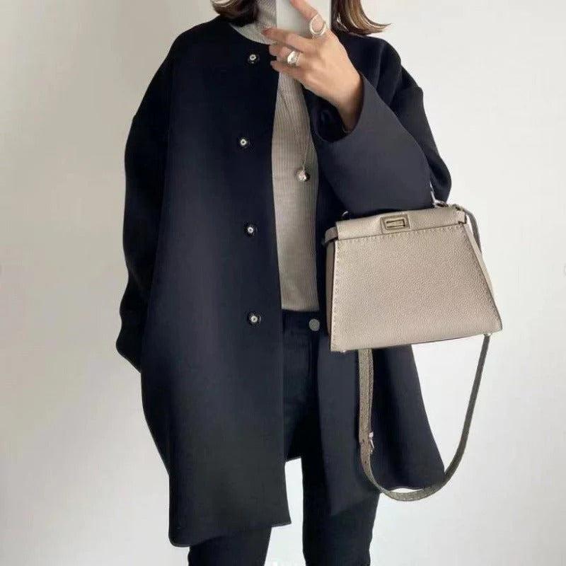 WW | Structured and Versatile Black Minimalist Button Coat