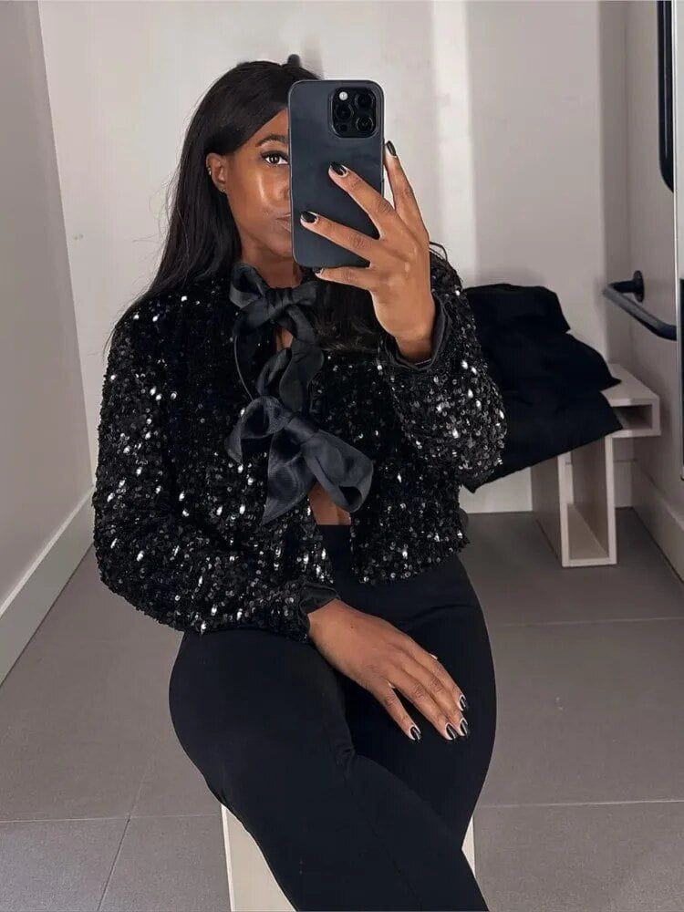 WW | Short tweed jacket with elegant and sophisticated knots