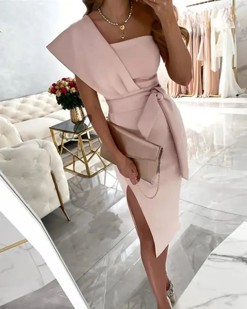 Asymmetric evening gown with belt and side slit for an elegant look